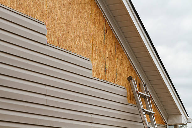Professional Vinyl Siding technician working in Fairview, GA